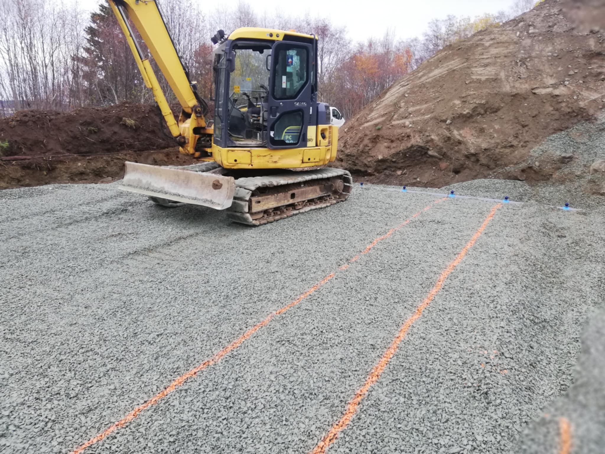 Fundamentarbeid med gravemaskin