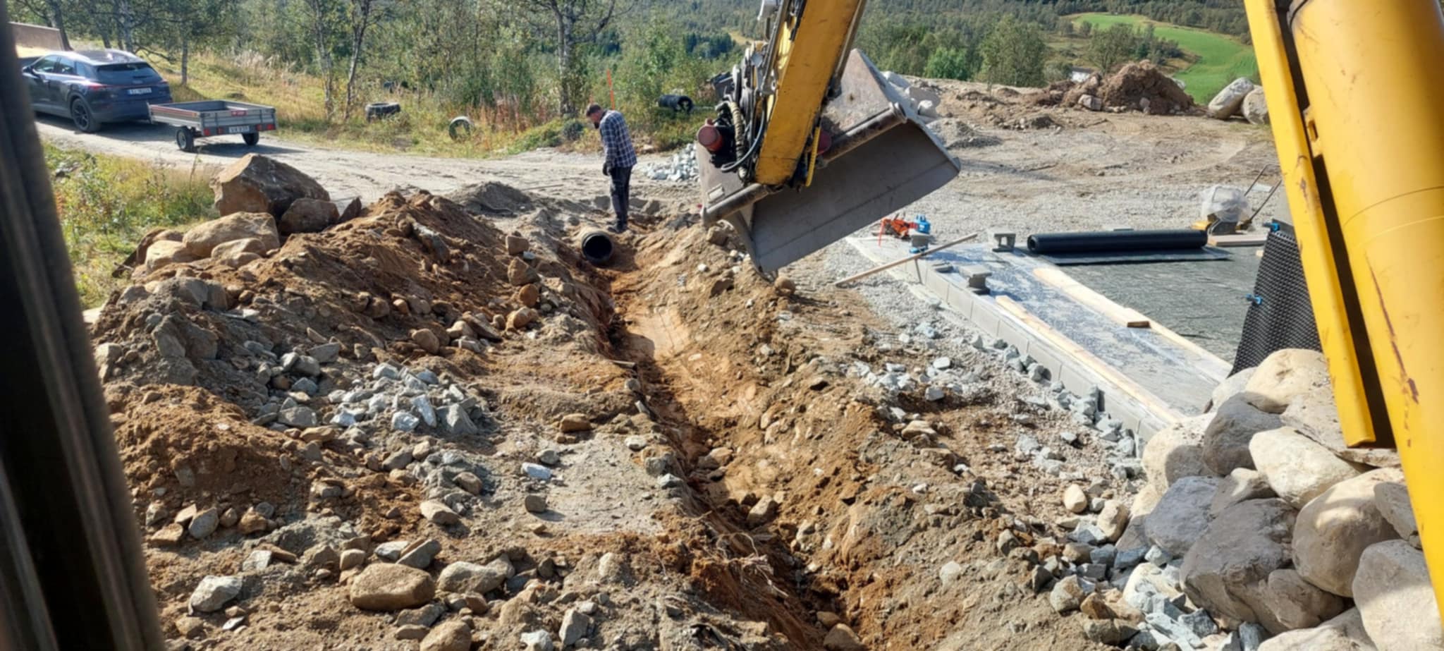 Graving av byggegrop for kjeller